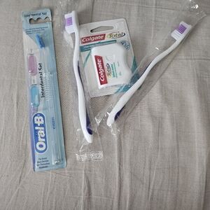 2 toothbrushes, Interdental Set and Colgate Total Floss